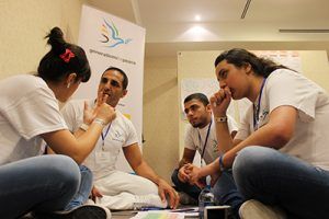 Generations for Peace volunteers brainstorming