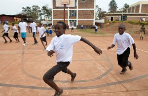 African children playing basketball