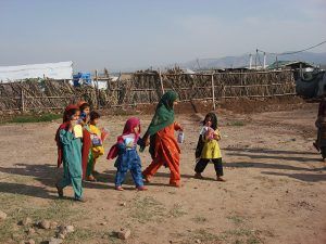 Young Pakistani girls walking outdoors