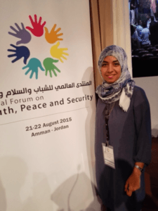 A volunteer attending the Global Forum on Youth, Peace and Security
